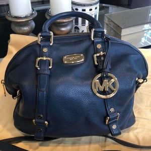 Michael Kors Blue purse with gold buckles